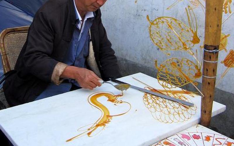 新年路边会有吹糖人的小摊-第1张图片-波音达百科